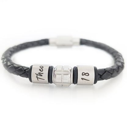 Personalised leather bracelet for teenage boy with engraved name and age rings