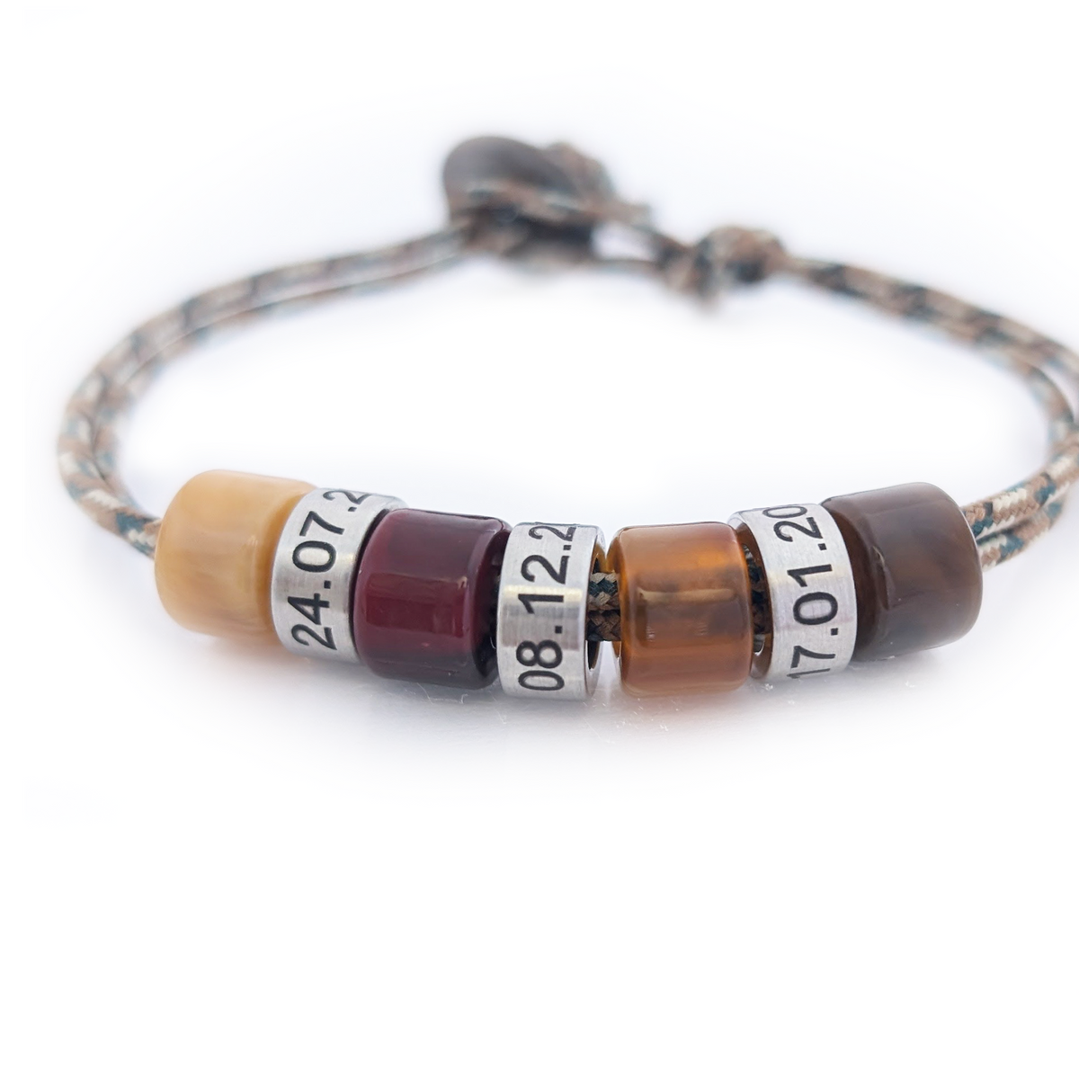 Men’s personalised cord bracelet with custom engraved date rings and coloured beads