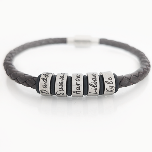 Personalised men's braided leather bracelet with engraved stainless steel name rings