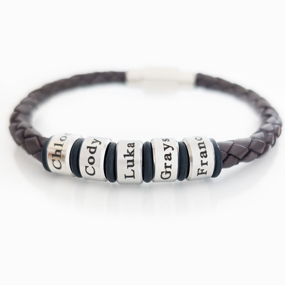Personalised men's leather bracelet with engraved stainless steel name rings